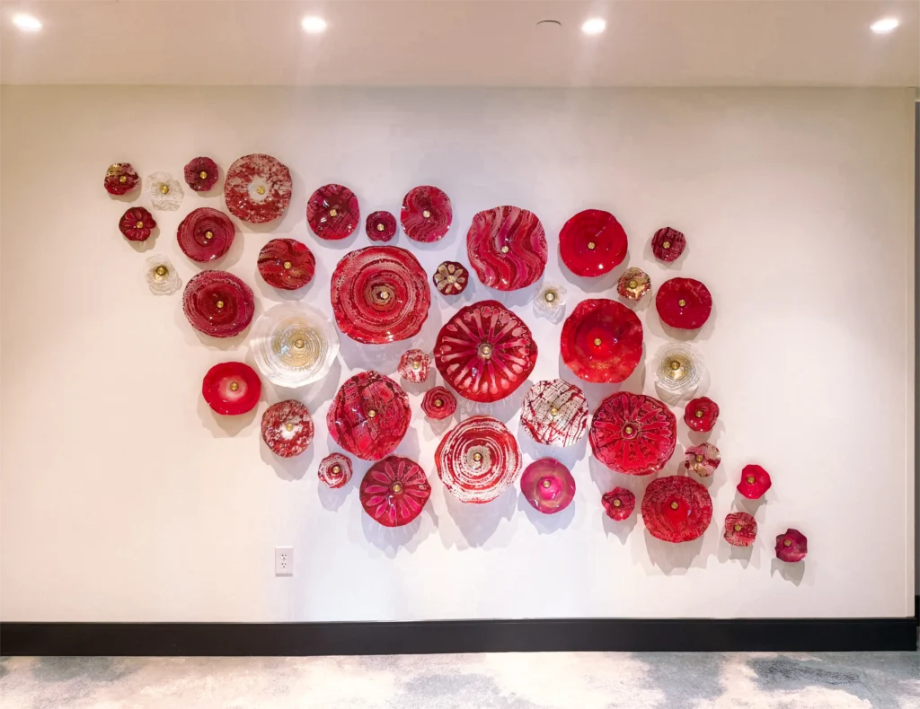Themed elevator lobby artwork at Universal Helios Grand Hotel